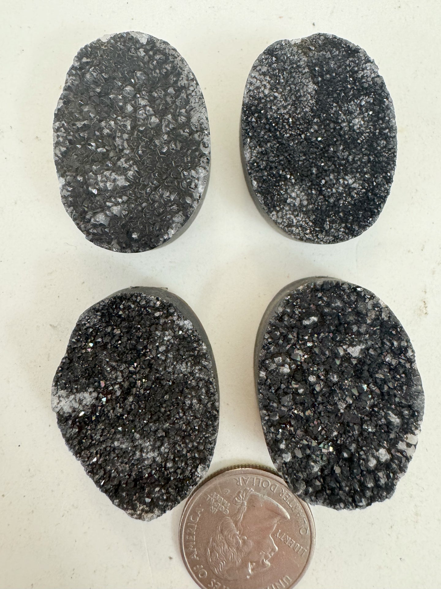 metallic black titanium coated druzy quartz, 35x25x12mm top to bottom drilled oval, sold per bead, may have edge or surface wear