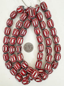 dark pale red white black chevron motif, vintage look glass, 21x16mm barrel mix, 15" strand, sold per strand
