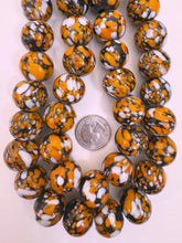 pale orange white black mix spotted swirl motif, vintage look glass, 20x18mm rondelle mix, 15" strand, sold per strand