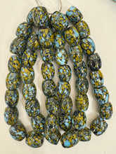 pale sky blue olive yellow black mix spotted swirl motif, vintage look glass, 23x19mm barrel mix, 15" strand, sold per strand