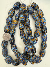 pale sky blue dark blue orange black mix spotted swirl motif, vintage look glass, 25x19mm barrel mix, 15" strand, sold per strand