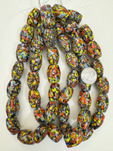pale red orange white blue yellow black mix spotted swirl motif, vintage look glass, 25x19mm barrel mix, 15" strand, sold per strand