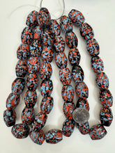 pale red blue black mix spotted swirl motif, vintage look glass, 25x19mm barrel mix, 15" strand, sold per strand