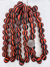 matte pale red black stripe motif, vintage look glass, 20mm round mix, 15" strand, sold per strand