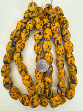 matte pale red orange red blue white black millefiori motif, vintage look glass, 24x18mm bowed tube barrel mix, 15" strand, sold per strand