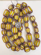 yellow red white black chevron motif, old stock vintage glass, 21-31mm barrel mix, 15" strand, sold per strand
