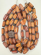 orange red white black chevron motif, old stock vintage glass, 26x13mm tube mix, 15" strand, sold per strand