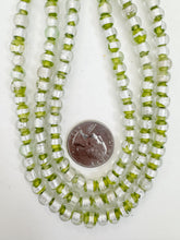 clear lime green metallic silver stripe inside lined motif, vintage look glass, 7mm round, 15" strand, sold per strand