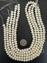 slightly off white, vintage stock fresh water pearl, 10x8mm potato, 15.5" strand,  standard pearl size hole, SOLD PER STRAND