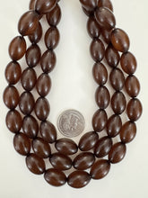 dark amber brown, single color, vintage look acrylic, 20x12mm bowed tube, 15" strand, sold per strand