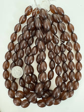 dark amber brown, single color, vintage look acrylic, 20x12mm bowed tube, 15" strand, sold per strand