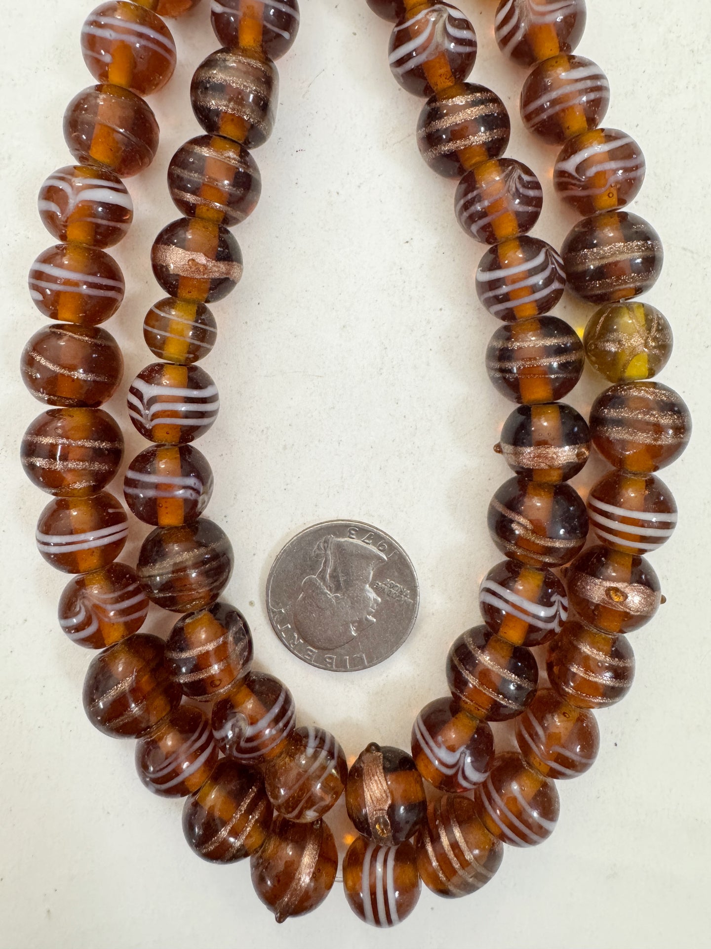 dark amber brown white metallic copper feathered swirl motif, vintage look glass, 13mm round semi-round mix, 15