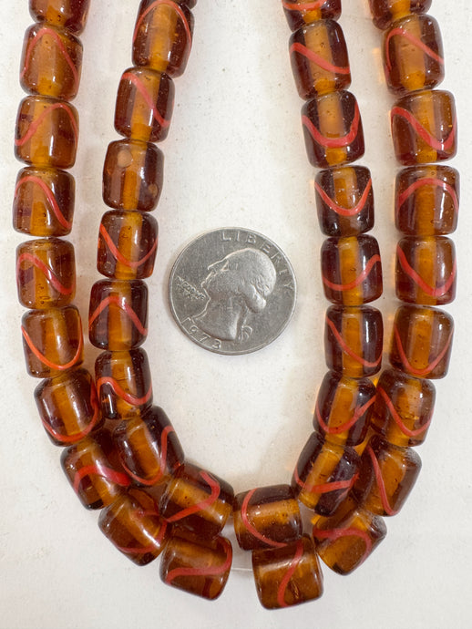 dark amber brown pale red swirl motif, vintage look glass, 12x9mm barrel, 15