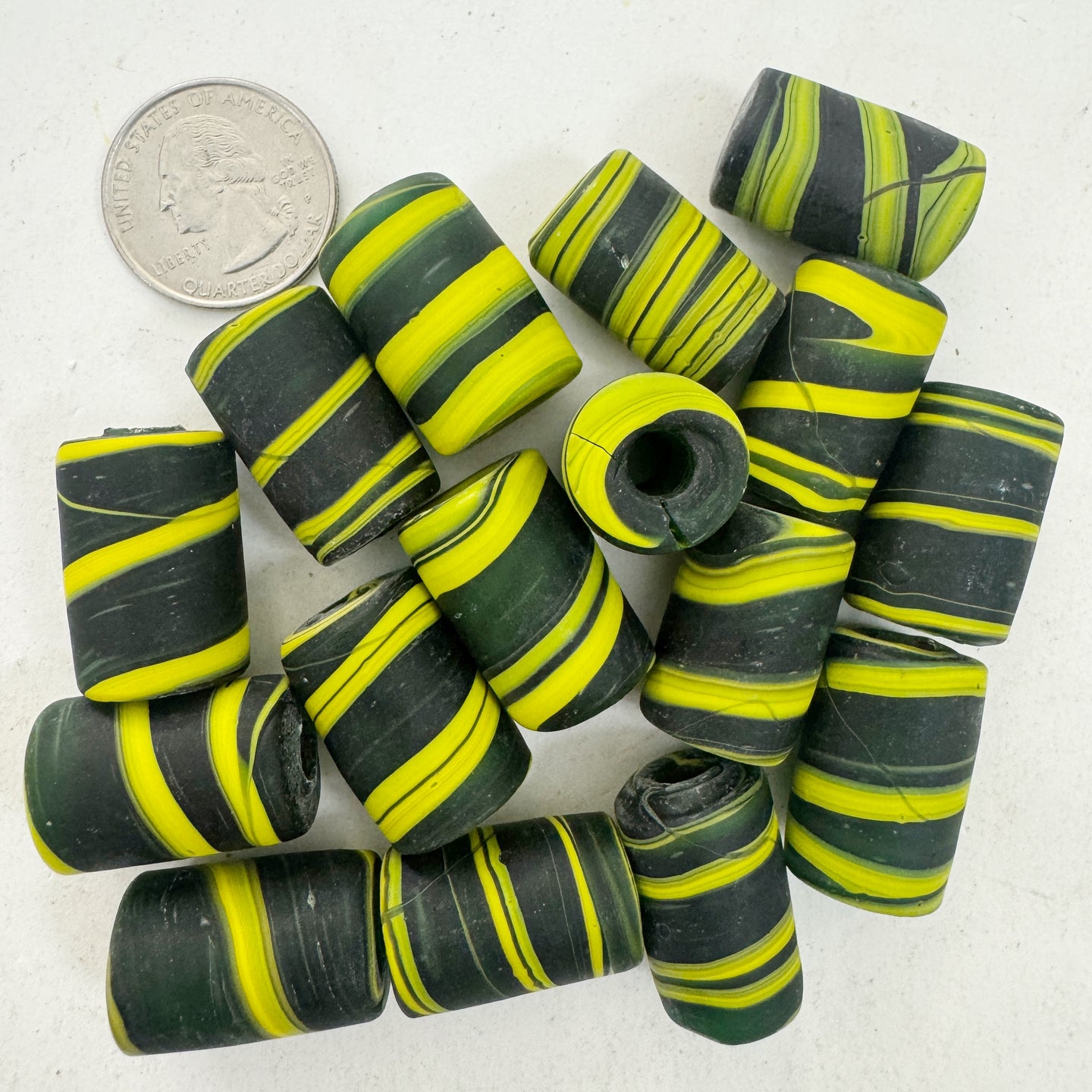 matte yellow green black swirl motif, vintage look glass, 24x14mm tube mix, sold per bead