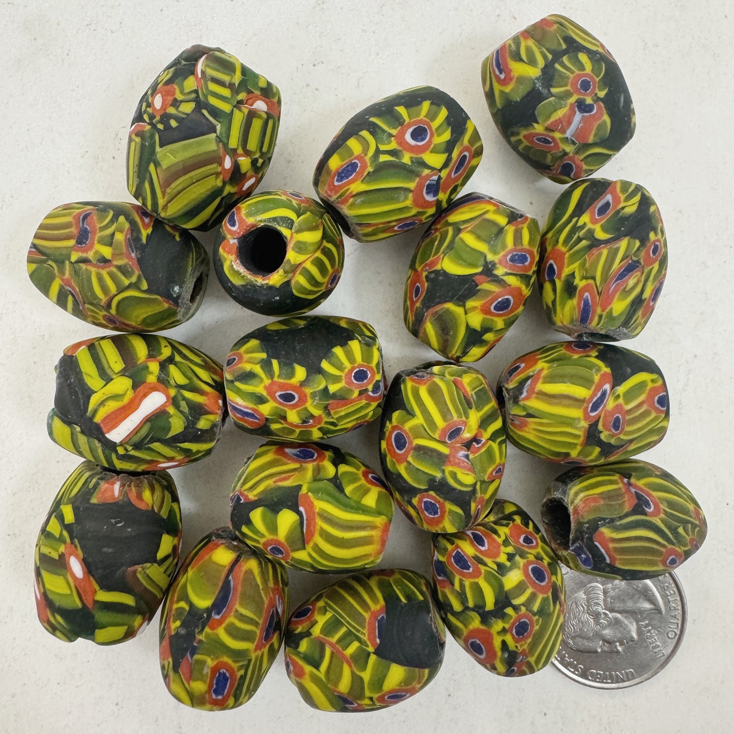 matte green yellow red blue white black millefiori motif, vintage look glass, 23x18mm bowed tube barrel mix, sold per bead