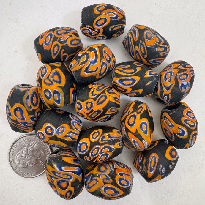 matte orange blue white black millefiori motif, vintage look glass, 24x18mm bowed tube barrel mix, sold per bead