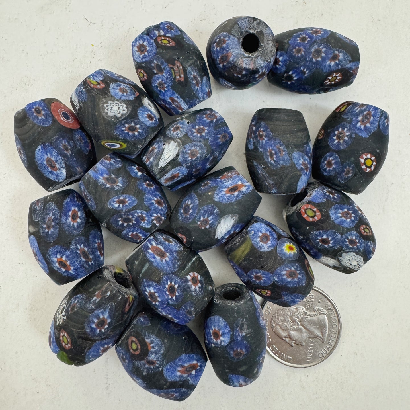 matte pale dark blue red white black millefiori motif, vintage look glass, 24x18mm bowed tube barrel mix, sold per bead