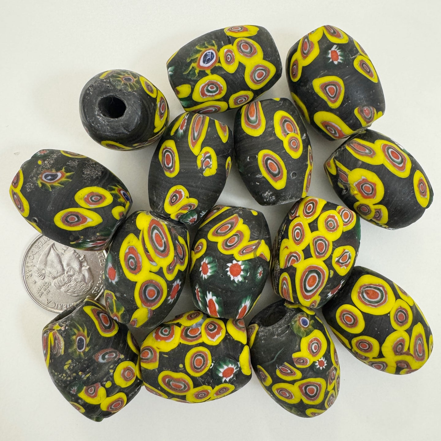 matte yellow red white blue green black millefiori motif, vintage look glass, 28x20mm bowed tube barrel mix, sold per bead