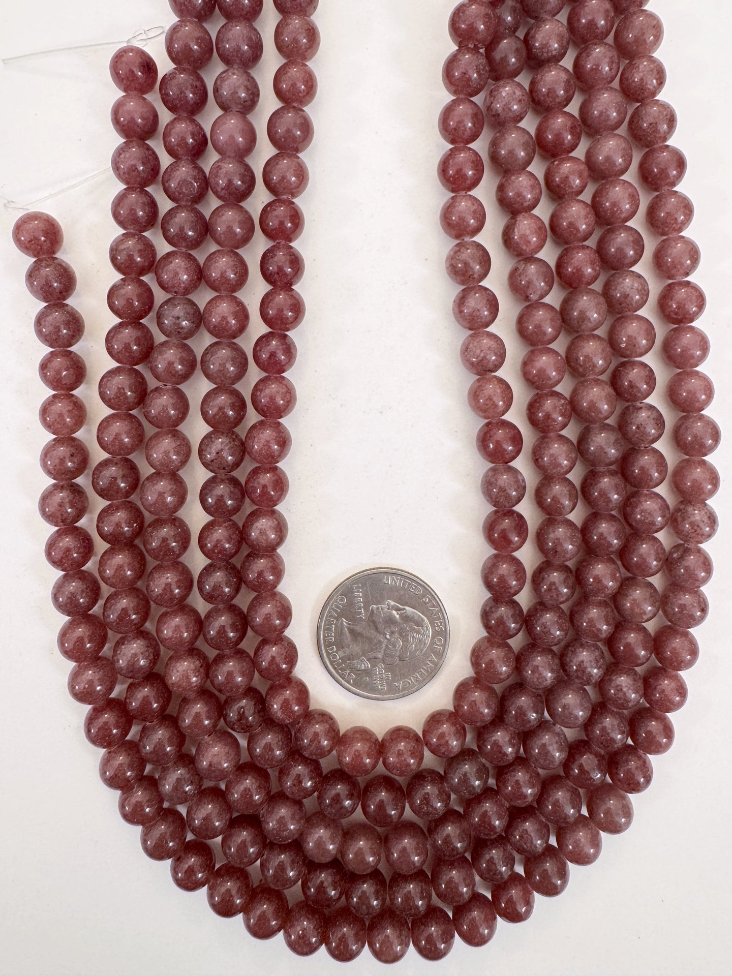 dark pale ruby enhanced quartz, 8mm round, 15