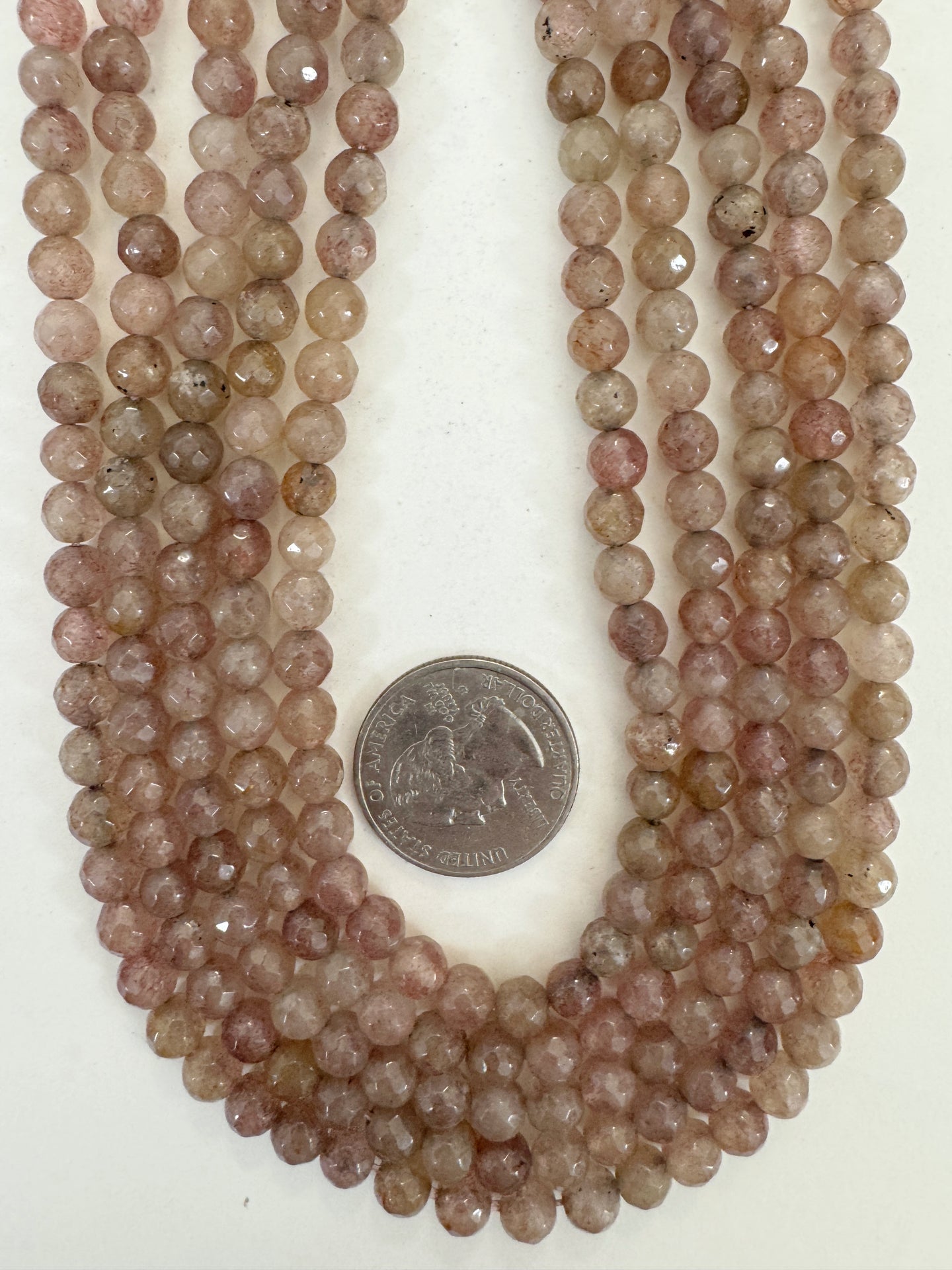 dark yellowed pale peach enhanced quartz, 6mm faceted round, 15