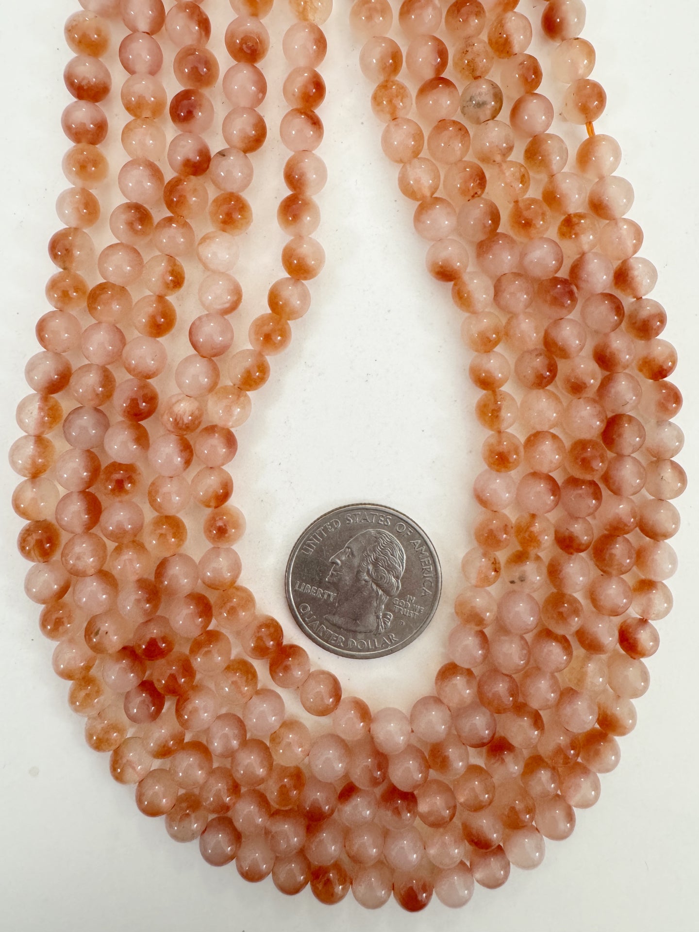 orange off white cloudy enhanced quartz, 6mm round, 15