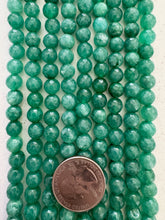 color enhanced quartz: pale dark emerald blue green, 8mm faceted round, 15" strand, SOLD PER STRAND