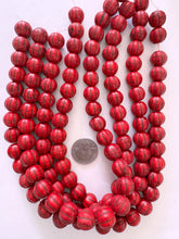 color enhanced magnesite: coral red, 14mm melon cut round, 15" strand, SOLD PER STRAND