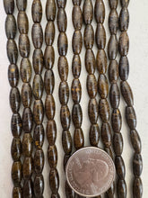 bronzite, 12x5mm bowed rice tube, 15" strand,  SOLD PER STRAND