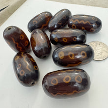 brown dark amber, circle wavy line motif, faux bone look, vintage stock resin, 38x22mm tube, sold per bead