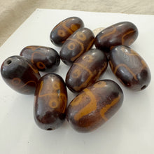 brown dark amber, circle bent line motif, faux bone look, vintage stock resin, 38x22mm tube, sold per bead