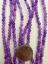 color enhanced quartz: pale bright purple, 4mm round, 15" strand, SOLD PER STRAND