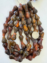 red golden horn, 22x17mm teardrop pear, 15" strand, sold per strand