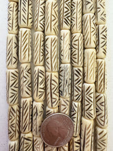 off white brown, carved crossing lines motif, vintage stock bone, 24x8mm tube, 15" strand, SOLD PER STRAND