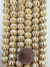 off white brown, carved line motif, vintage stock bone, 13x11mm rondelle, 11.5" strand, SOLD PER STRAND