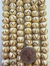 off white brown, carved zig zag lines motif, vintage stock bone, 12x10mm rondelle, 11.5" strand, SOLD PER STRAND