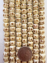 off white, carved sarburst lines motif, vintage stock bone, 10x8mm rondelle, 15" strand,  SOLD PER STRAND
