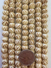 off white brown, carved up lines motif, vintage stock bone, 10x8mm rondelle, 15" strand,  SOLD PER STRAND