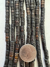 dark brown, carved lines motif, vintage stock bone, 14x8mm - 12x6mm barrel mix, 15" strand, SOLD PER STRAND