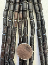 dark brown, carved lines motif, vintage stock bone, 25x6mm tube, 15" strand, SOLD PER STRAND