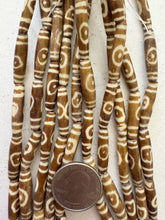 golden brown off white, lines eye motif, vintage stock bone, 24x6mm bowed tube, 15" strand, SOLD PER STRAND (batch 2)