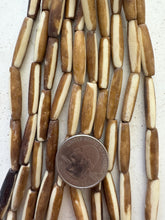 golden brown off white, lines motif, vintage stock bone, 24x6mm bowed tube, 15" strand, SOLD PER STRAND (batch 1)