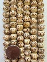 off white brown, carved circles motifs, vintage stock bone, 12x9mm rondelle, 11" strand, SOLD PER STRAND