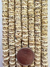 off white black, carved dot wavy line motifs, vintage stock bone, 9x5mm rondelle, 15" strand, SOLD PER STRAND
