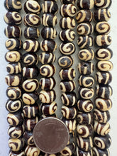 brown off white, spiral motif, vintage stock bone, 12x8mm rondelle, 15" strand, SOLD PER STRAND
