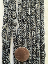 black off white, carved x pattern motif, vintage stock bone, 12x7mm barrel tube, 15" strand, SOLD PER STRAND