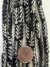 black off white, branching tree pattern motif, vintage stock bone, 26x8mm tube, 15" strand, SOLD PER STRAND