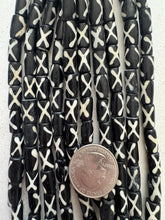 black off white, x motif, vintage stock bone, 12x7mm tube, 15" strand, SOLD PER STRAND