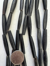 black horn, 25-40mm random assortment tube, 15" strand, SOLD PER STRAND