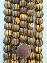brown black, carved melon cut motif, vintage stock horn, 15x12mm rondelle, 15" strand, SOLD PER STRAND