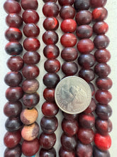 red vintage stock horn, 13x10mm rondelle, 15" strand, SOLD PER STRAND